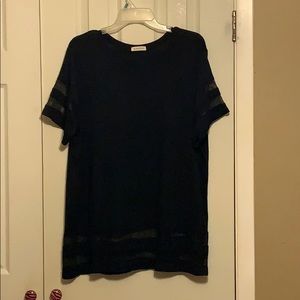 Black scoop neck top.